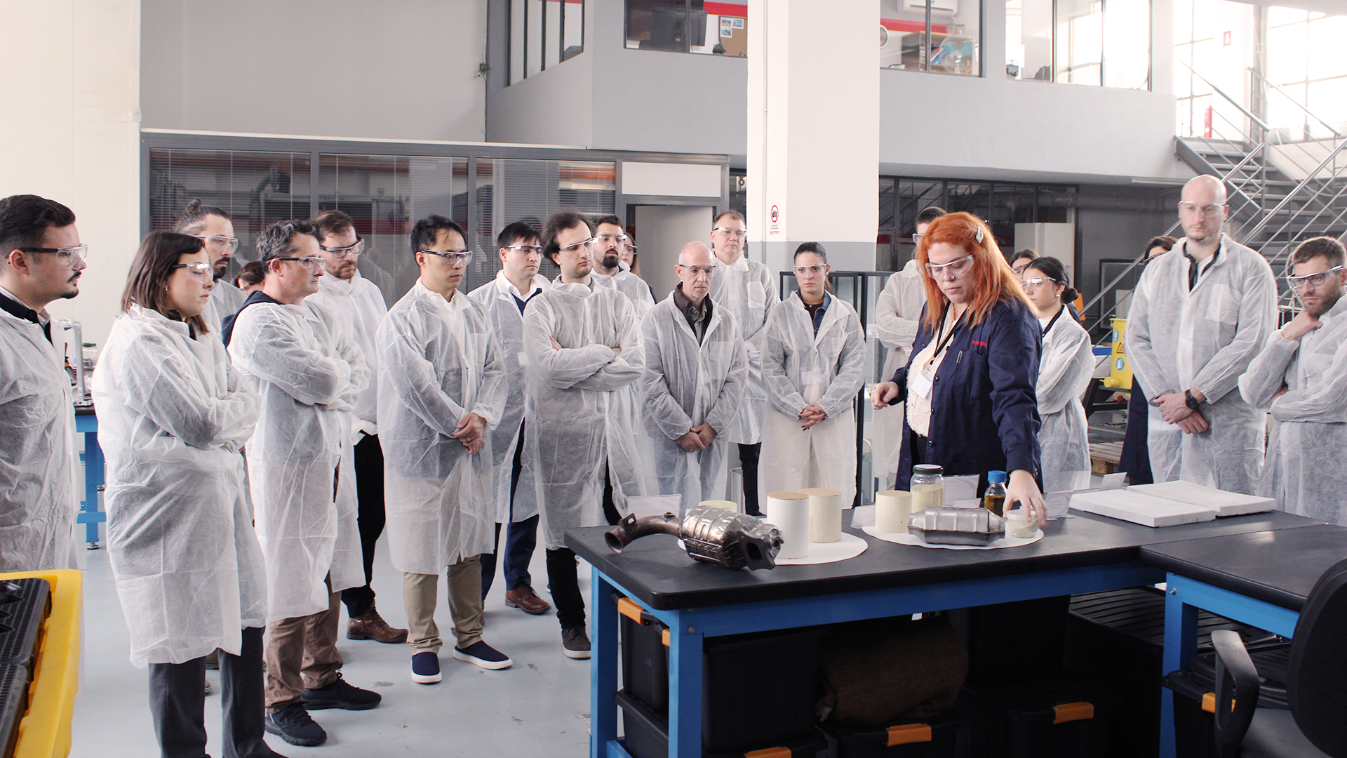 DATA4CIRC team members receiving a demonstration of MONOLITHOS' work with catalytic converters